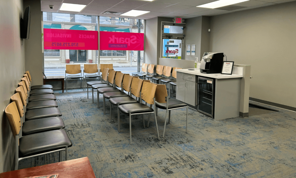 Waiting area with rows of chairs at the Spark Orthodontics Danville, PA office