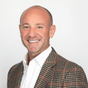 Headshot of Dr. Jason M. Hartman, DMD, MS, Spark Orthodontics orthodontist