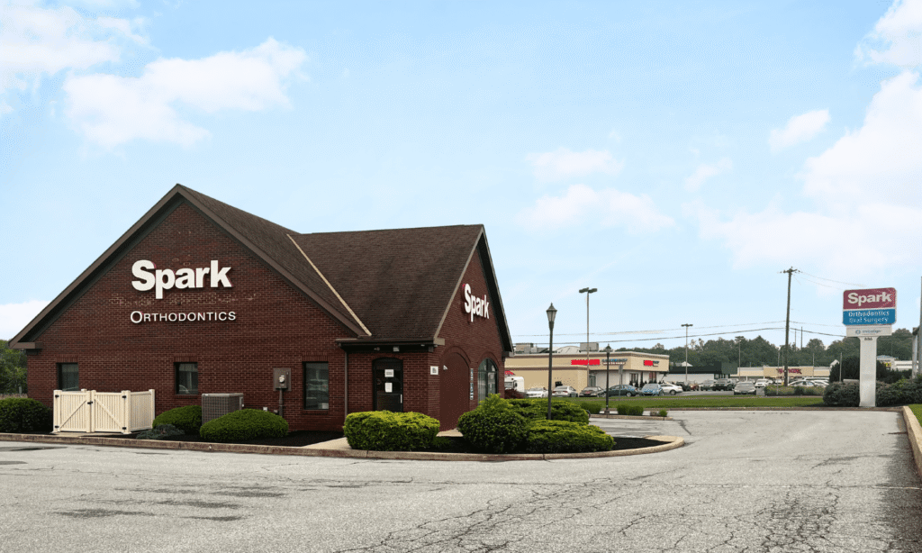 Exterior of the Spark Orthodontics Lancaster, PA office building in a shopping plaza