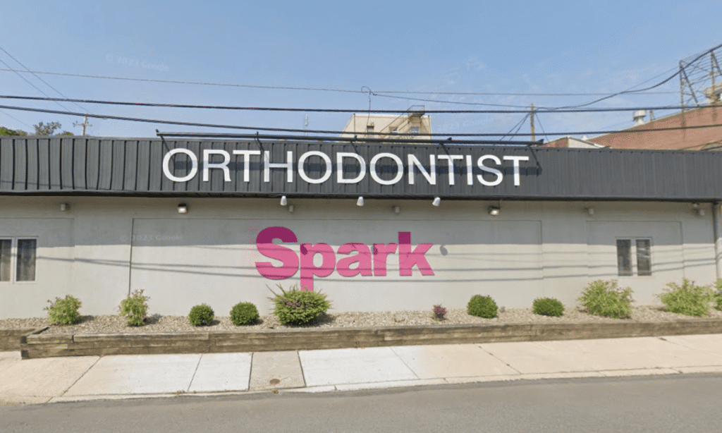 Storefront sign reading Orthodontist Spark on the exterior of the Spark Orthodontics Pottsville, PA office