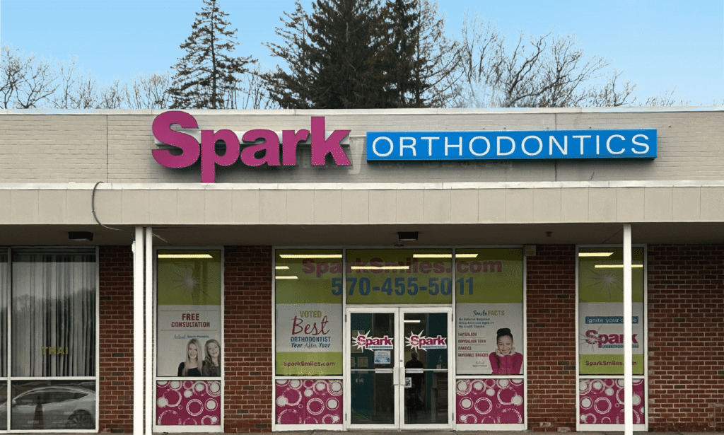 Storefront exterior with Spark Orthodontics signage at the Hazleton, PA office