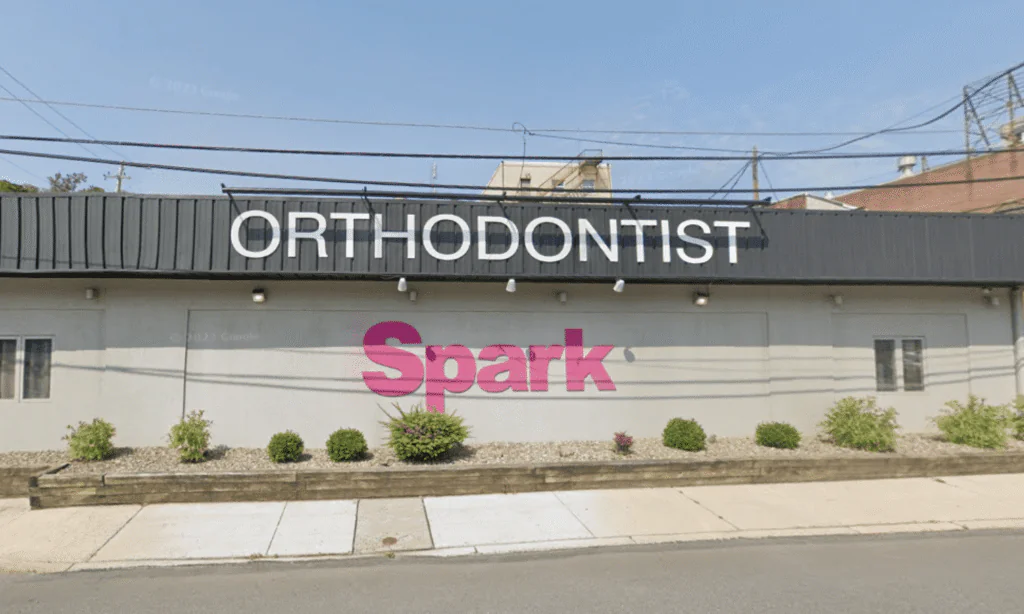 Storefront sign reading Orthodontist Spark on the exterior of the Spark Orthodontics Pottsville, PA office