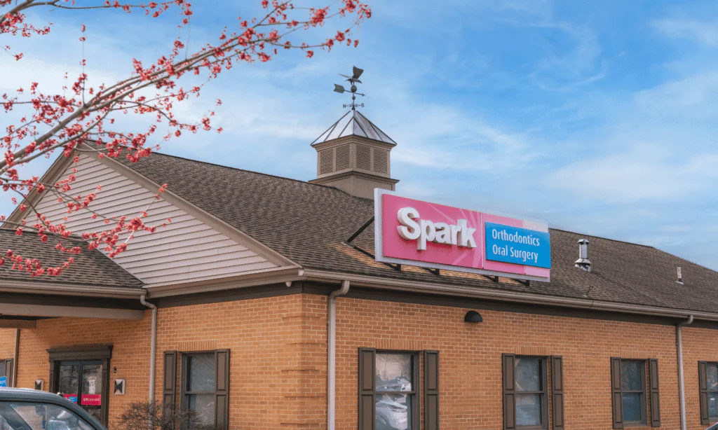 Exterior of the Spark Orthodontics Reading, PA office building with rooftop sign
